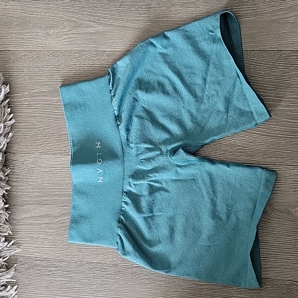 NVGTN teal pro shorts